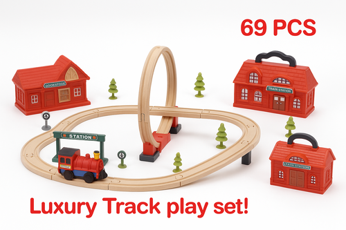 Wooden toy train track set with red buildings and trees on a white background